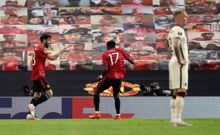 Bruno Fernandes, left, celebrates his opening goal with Fred