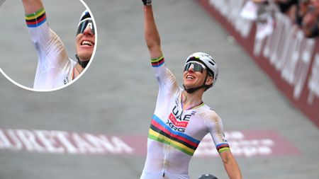 Tadej Pogacar celbrating on the Strade Bianche finish line