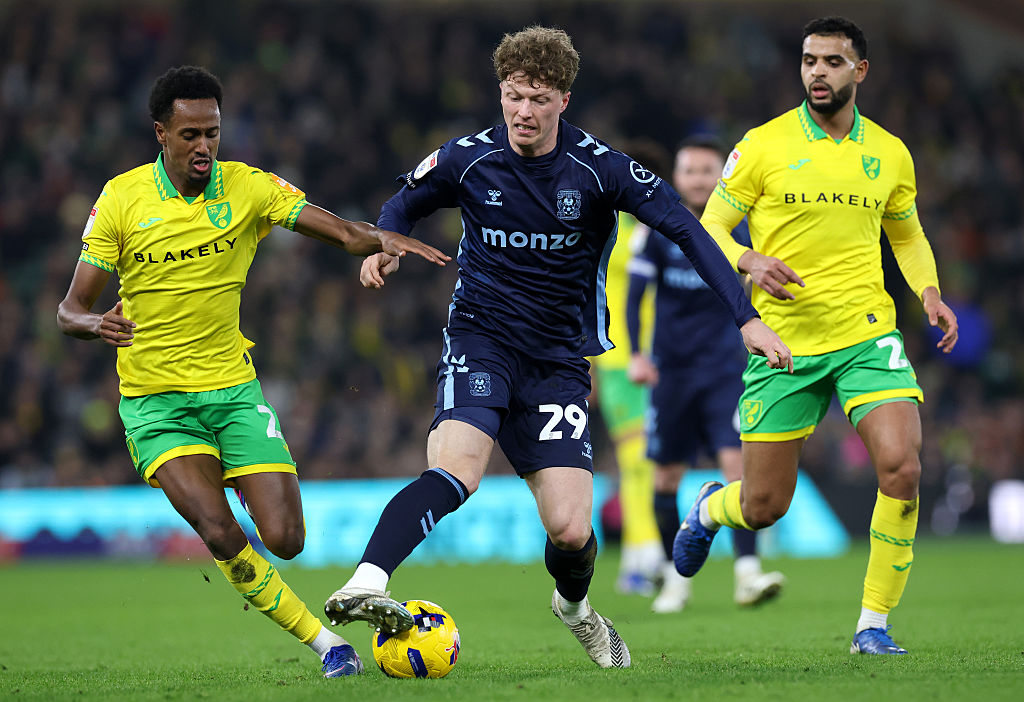 NORWICH, ENGLAND - JANUARY 26: Victor Torp of Coventry City is challenged by Ali Ahmed of Norwich City during the Sky Bet Championship match between Norwich City and Coventry City at Carrow Road on January 26, 2026 in Norwich, England. (Photo by David Rogers/Getty Images)