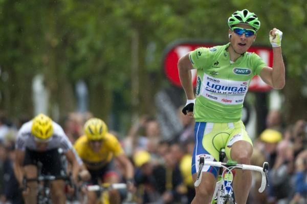 Peter Sagan (Liquigas-Cannondale) dances with joy on his bike upon winning another Tour stage