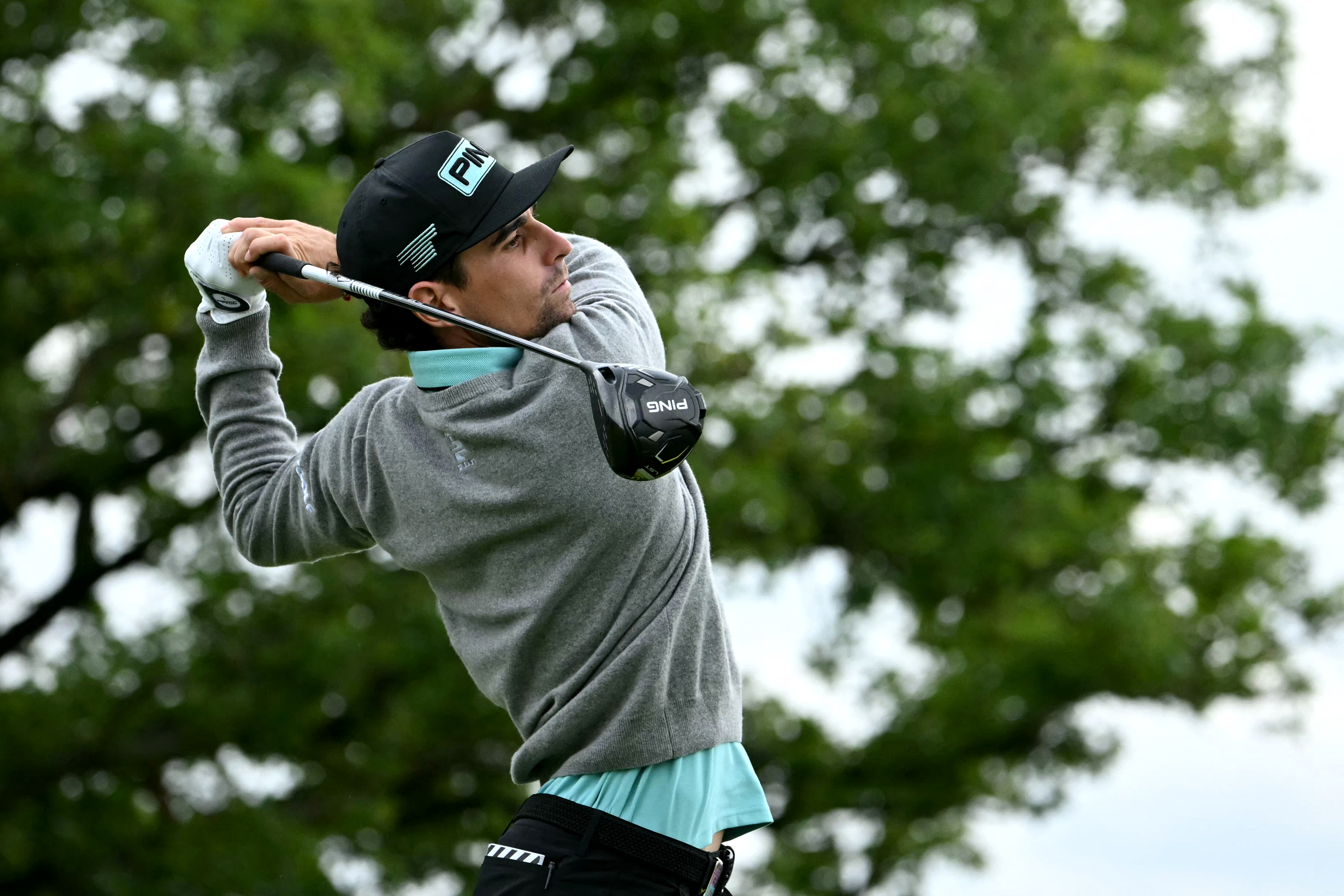 Joaquin Niemann hits a driver