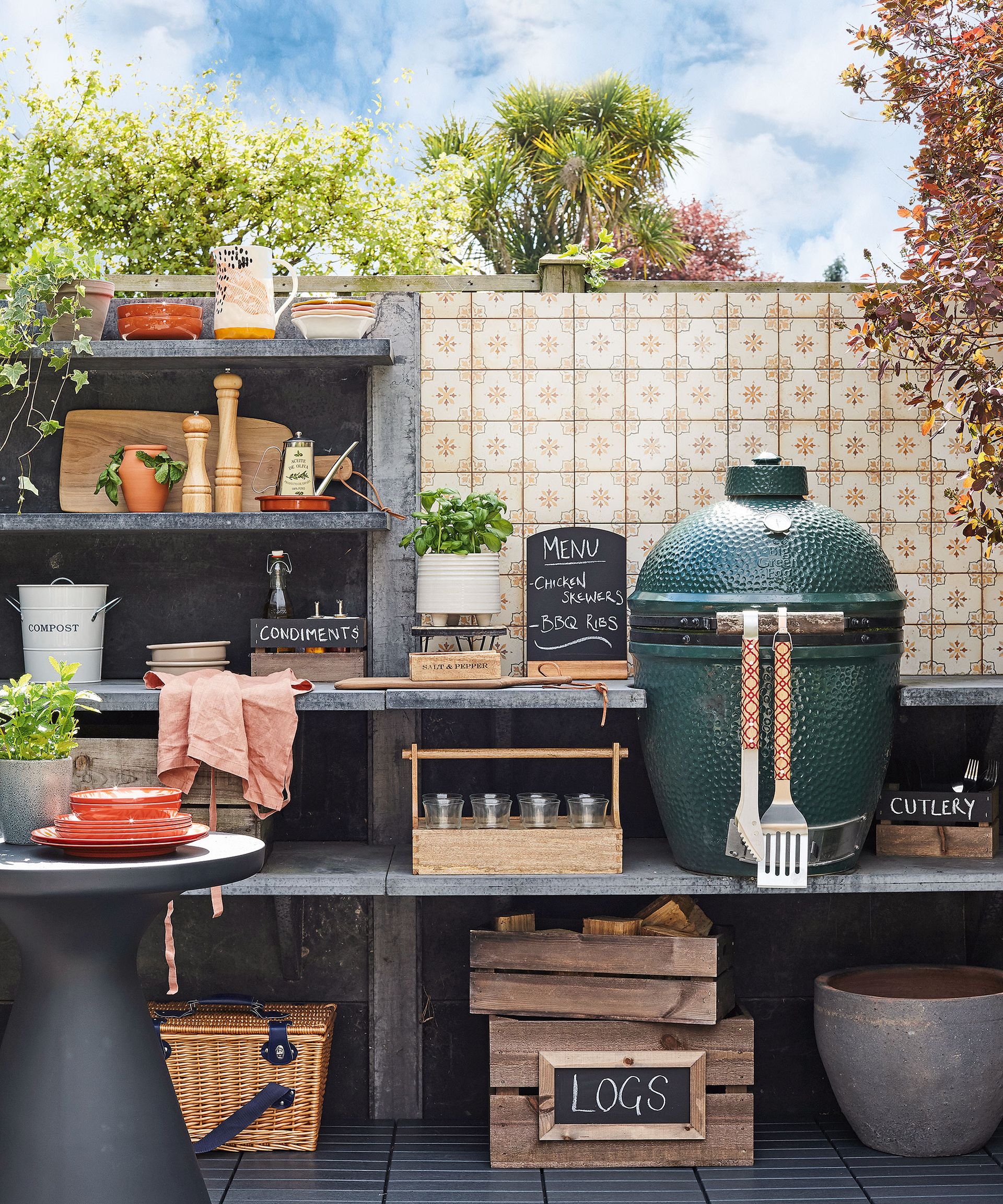 Different outdoor kitchen ideas illustrated with a grill and cooking accessories and storage