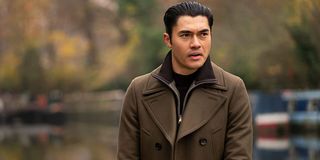 The Gentlemen Henry Golding in a nice overcoat