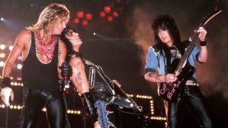 Motley Crue performing onstage in 1987