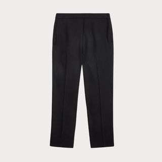 Flat lay image of black trousers