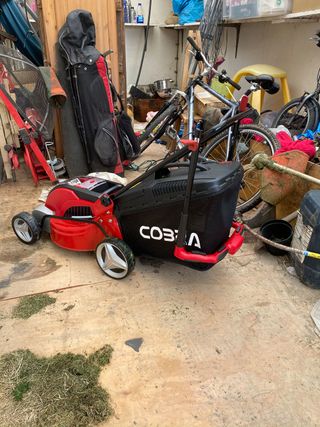 The handle of the Cobra MX41-40V lawn mower folds down for easy storage