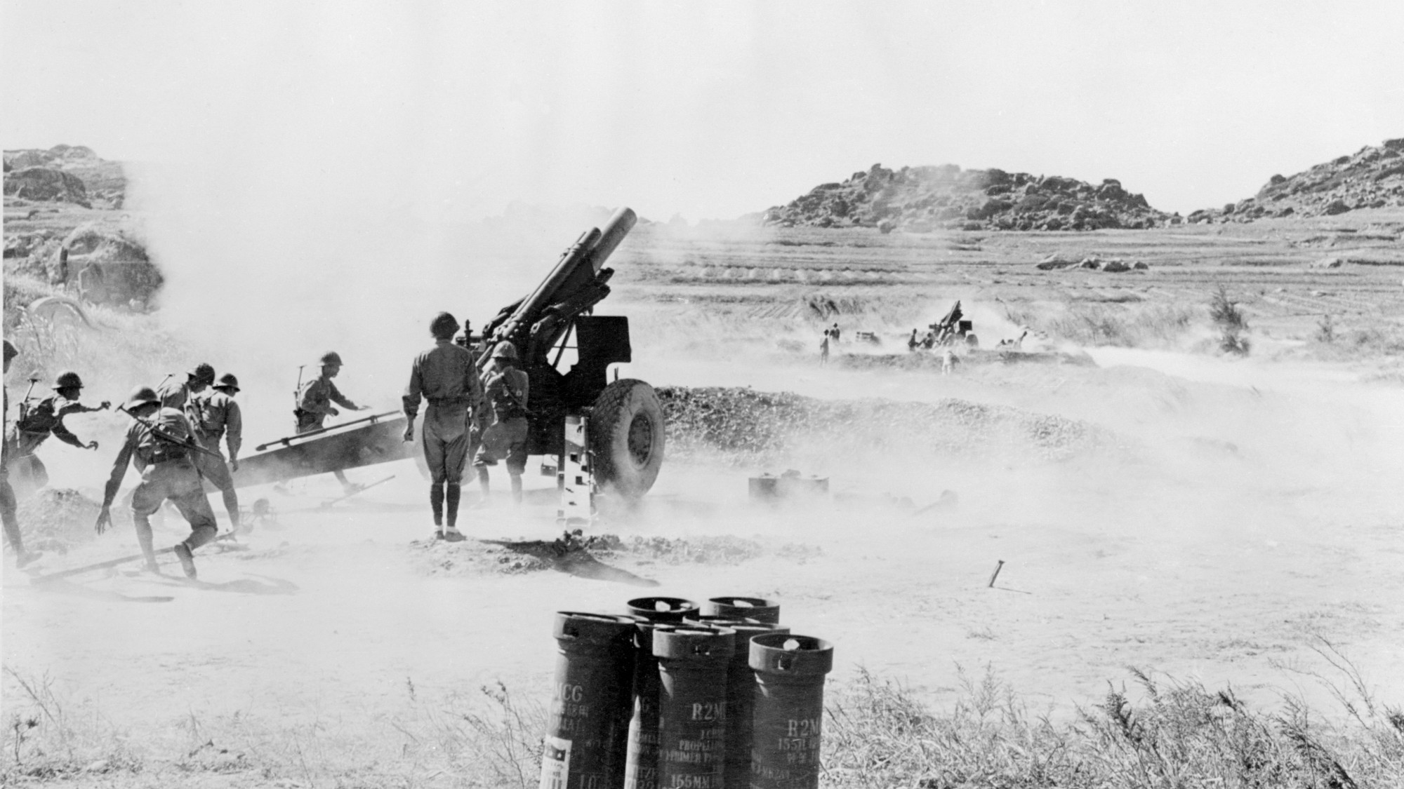 Chinese Nationalist forces firing an artillery piece