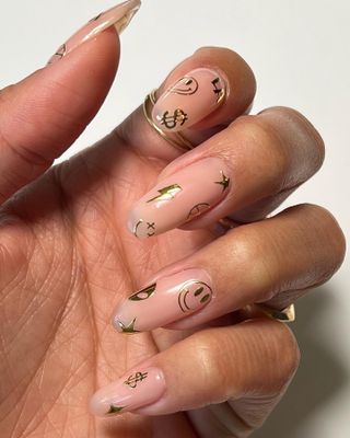 Gold nail polish design.