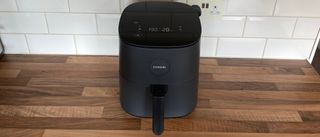 The Cosori Pro LE Air Fryer L501 on a kitchen countertop