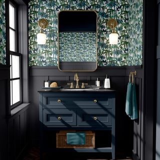 bathroom with grey washbasin with mirror and wallpaper