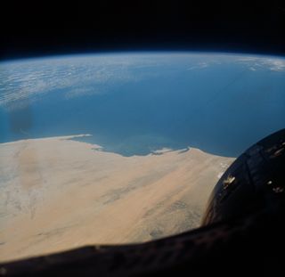 Cap Blanc and Levrier Bay on the coast of Spanish Sahara and Mauritania, as seen from the Gemini-6 spacecraft during its 15th revolution of Earth, on Dec. 16, 1965.