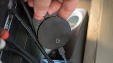 Chromecast Ultra behind TV with cables