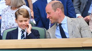 Prince George of Cambridge and Prince William, Duke of Cambridge attend The Wimbledon Men's Singles Final