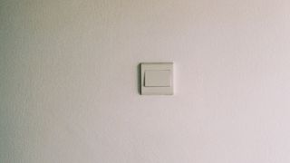 smart light switch on bare wall
