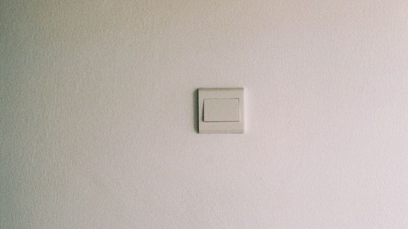 smart light switch on bare wall