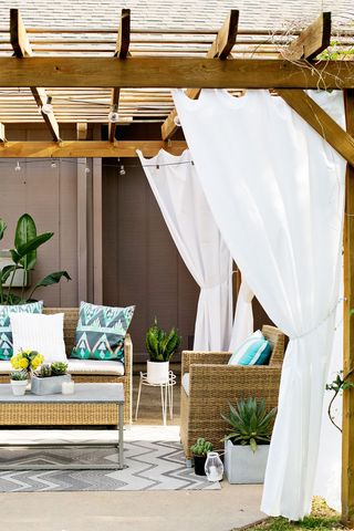 DIY canopy ideas, pergola canopy with curtains by abeautifulmess.com