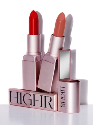 lipsticks by Highr in pink metal cases against white
