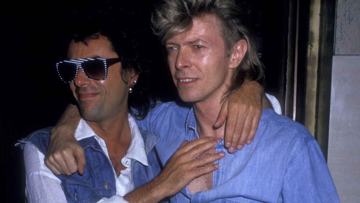  Earl Slick and David Bowie sighted on August 4, 1987 at The China Club in New York City.