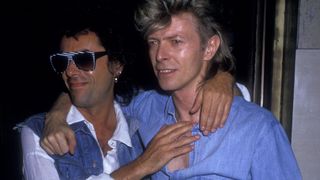  Earl Slick and David Bowie sighted on August 4, 1987 at The China Club in New York City.