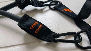 MyFit Resistance Bands Set: detail shot of a band, including the weight details and carabiner