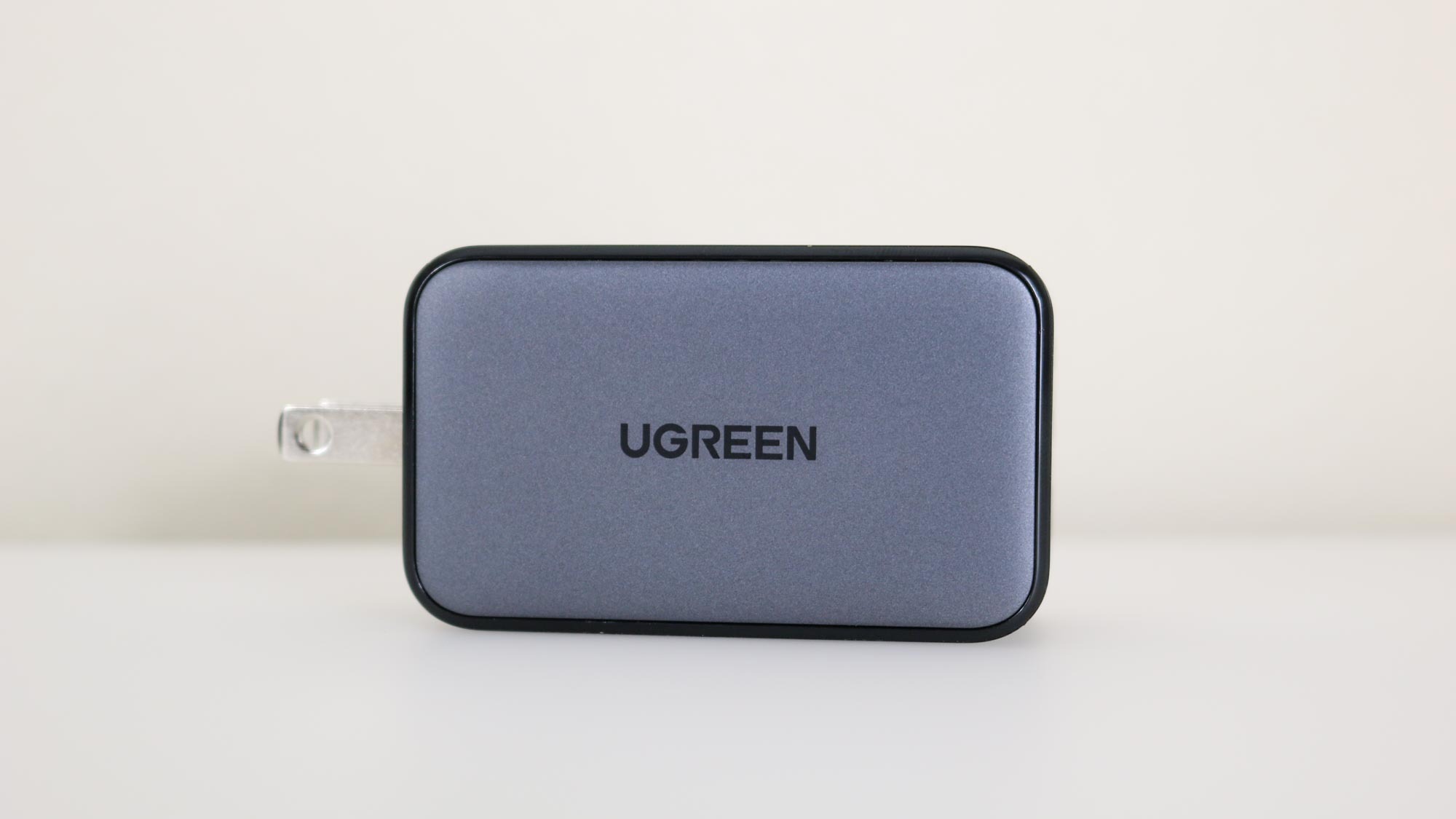 The retractable power plug on the UGREEN Nexode 65W Charger