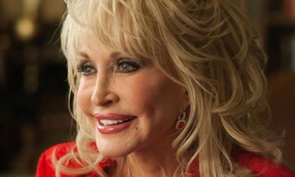 Dolly Parton's plastic surgery is both a constant punchline and a major distraction in the movie "Joyful Noise."