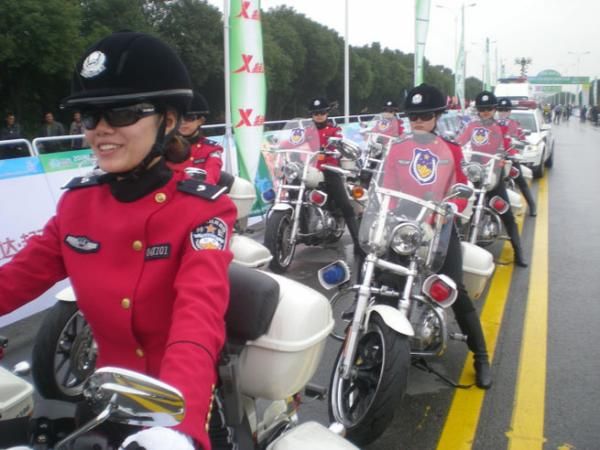 The escort for the peloton of the Tour of Taihu.