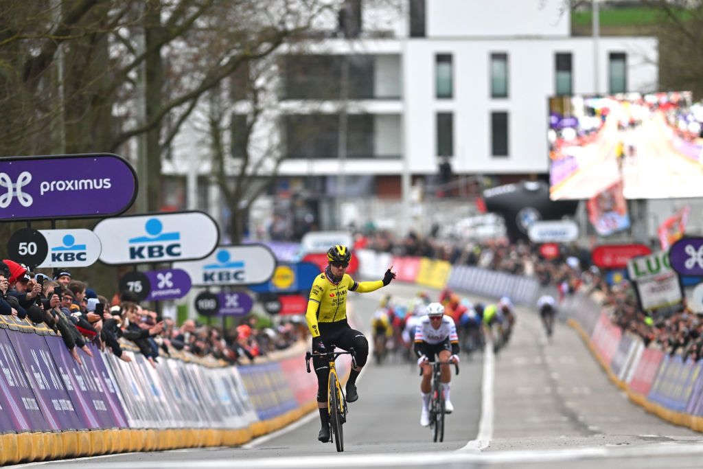 NINOVE BELGIUM FEBRUARY 24 Race winner Jan Tratnik of Slovenia and Team Visma Lease A Bike and Nils Politt of Germany and UAE Team Emirates sprint at finish line during the 79th Omloop Het Nieuwsblad 2024 Mens Elite a 2022km one day race from Ghent to Ninove UCIWT on February 24 2024 in Ninove Belgium Photo by Luc ClaessenGetty Images