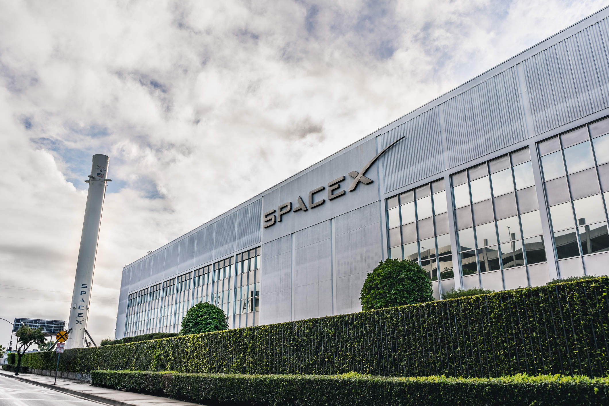 SpaceX (Space Exploration Technologies Corp.) headquarters; Falcon 9 rocket displayed on the left; SpaceX is a private American aerospace manufacturer held by Scottish Mortgage investment trust
