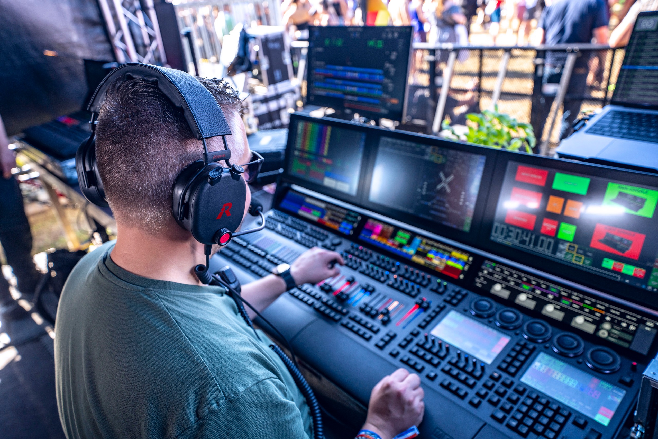 The Riedel OnAir headsets being used at a concert and mixing board.