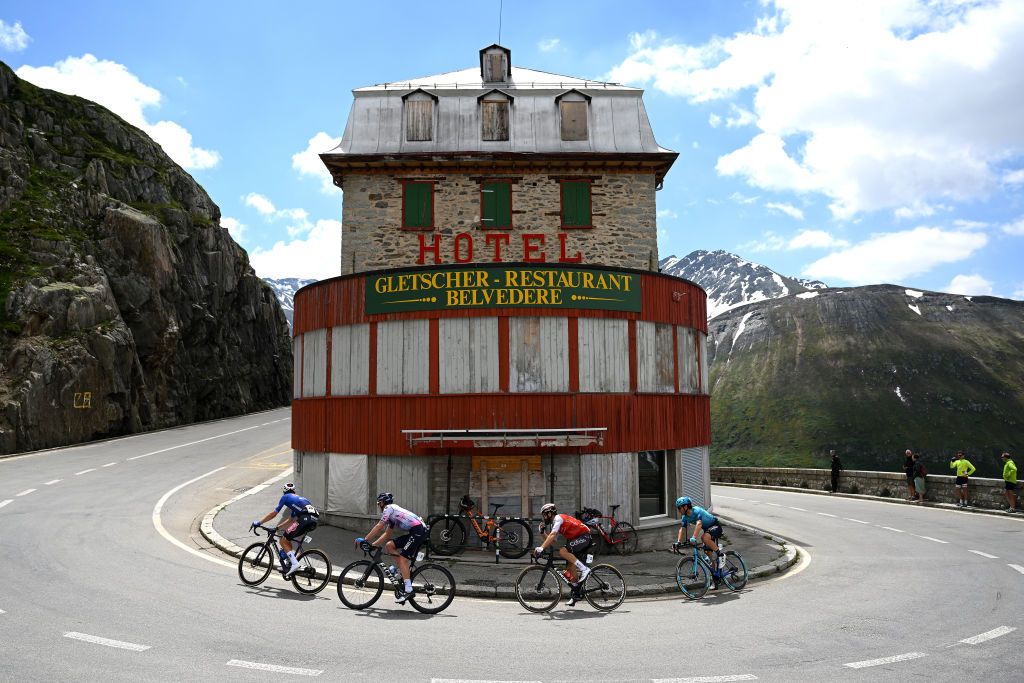 LA PUNT SWITZERLAND JUNE 15 LR Xandro Meurisse of Belgium and Team AlpecinDeceuninck Daryl Impey of South Africa and Team IsraelPremier Tech Simon Geschke of Germany and Team Cofidis and Fabio Felline of Italy and Astana Qazaqstan Team competing at the Col de la Furka 2429m passing in front of the Htel Belvdre during the 86th Tour de Suisse 2023 Stage 5 a 211km stage from Fiesch to La Punt 1696m UCIWT on June 15 2023 in La Punt Switzerland Photo by Dario BelingheriGetty Images