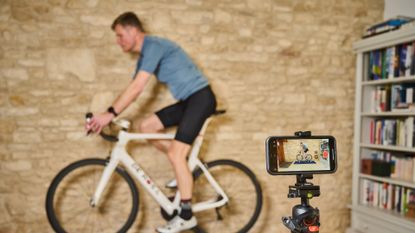 Male reviewer using the MyVeloFit AI app