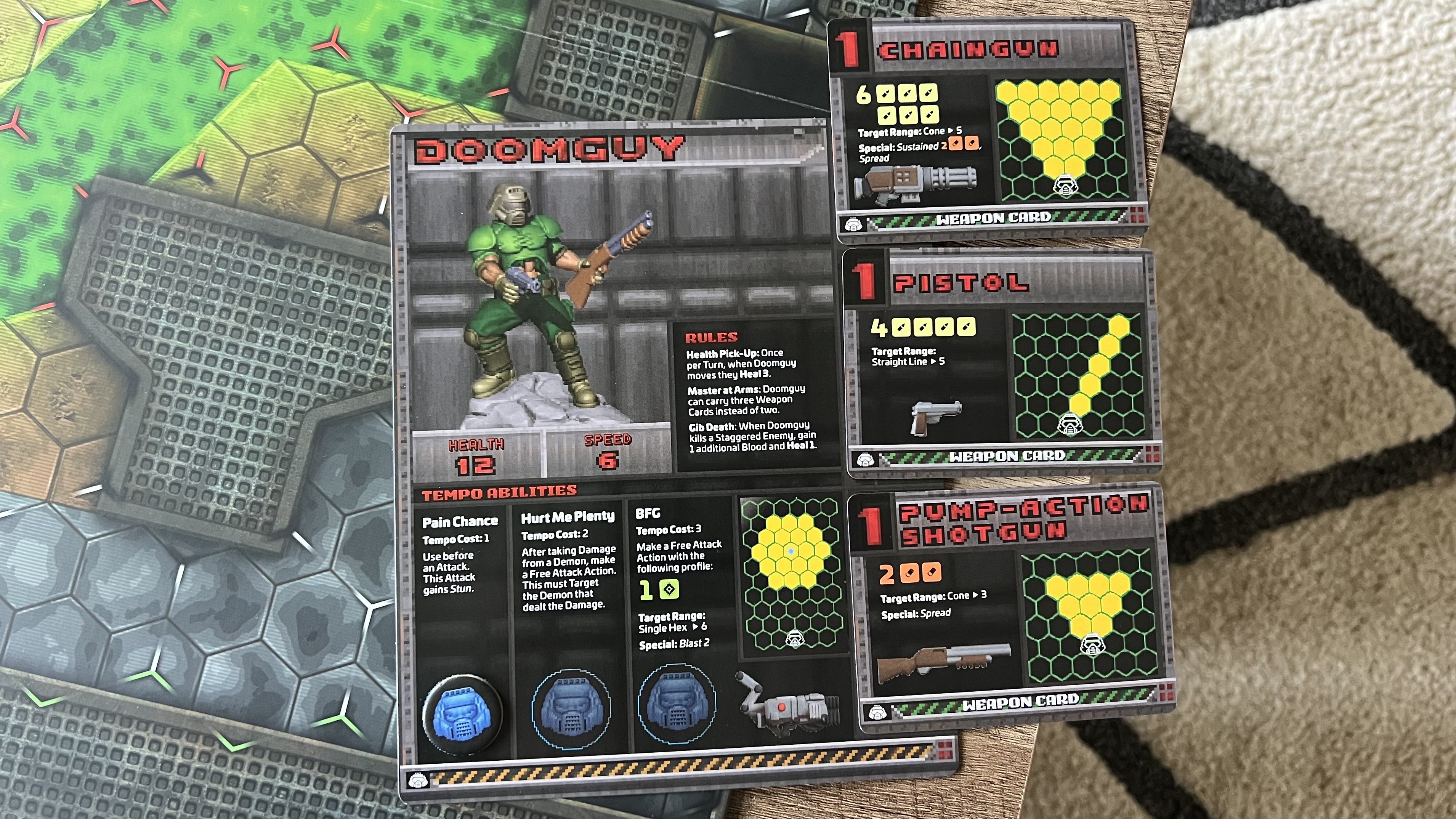 Top down view of Doom Guy character card loadout in Doom Arena Board Game