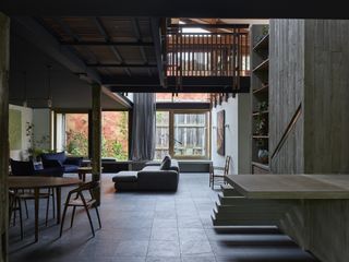 Wide angle, flowing interior look at Stockroom Cottage by Architects EAT