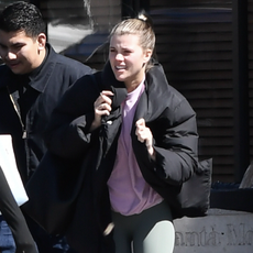 Sofia Richie is spotted on a rare outing in Los Angeles. Richie stepped out on a blustery day wearing a black puffer jacket, green leggings, and trainers.