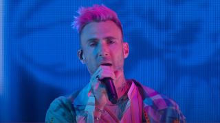 Adam levine performing on The Voice finale