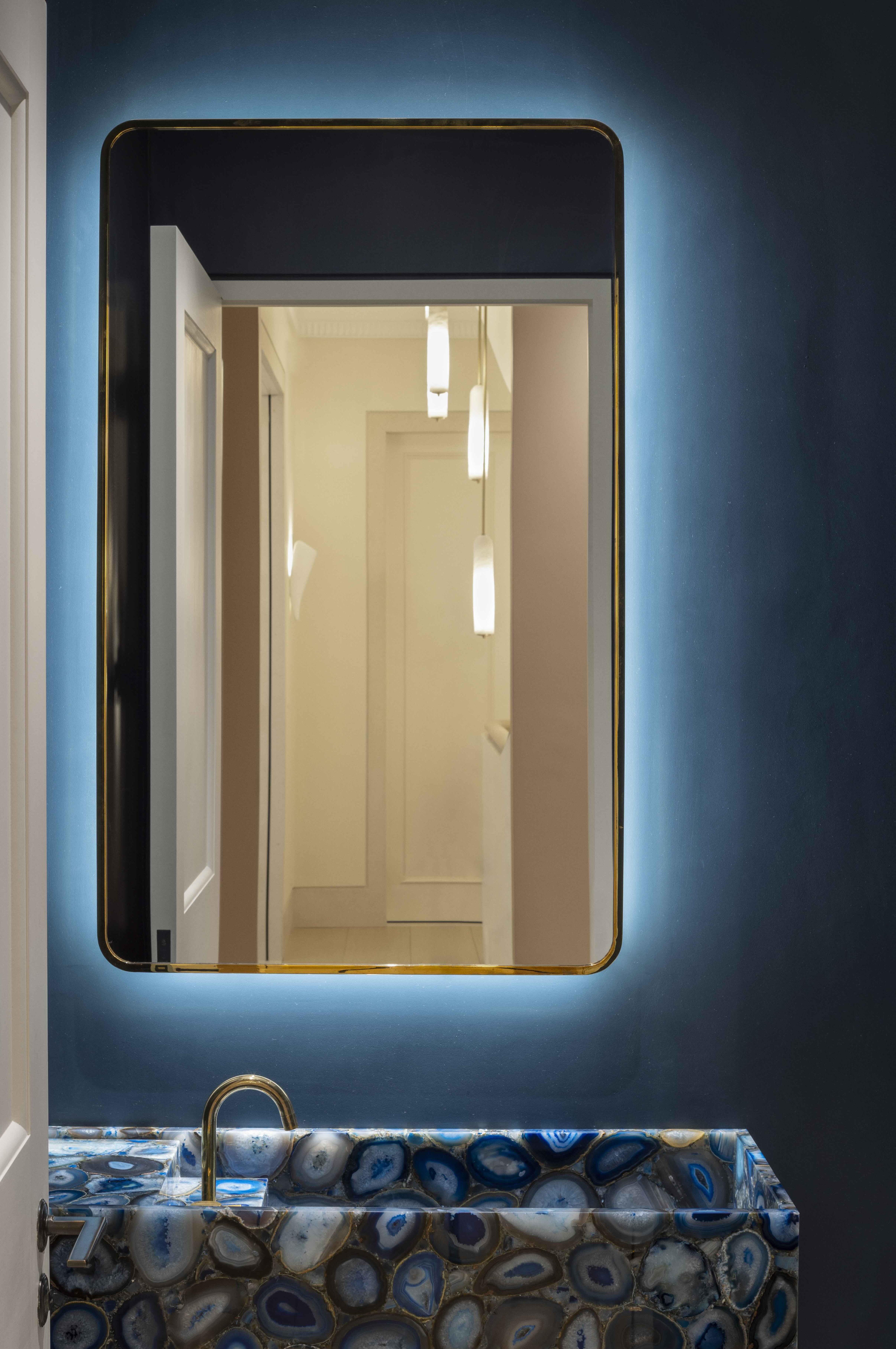 A powder room painted in Farrow &amp;amp; Ball's Hague Blue