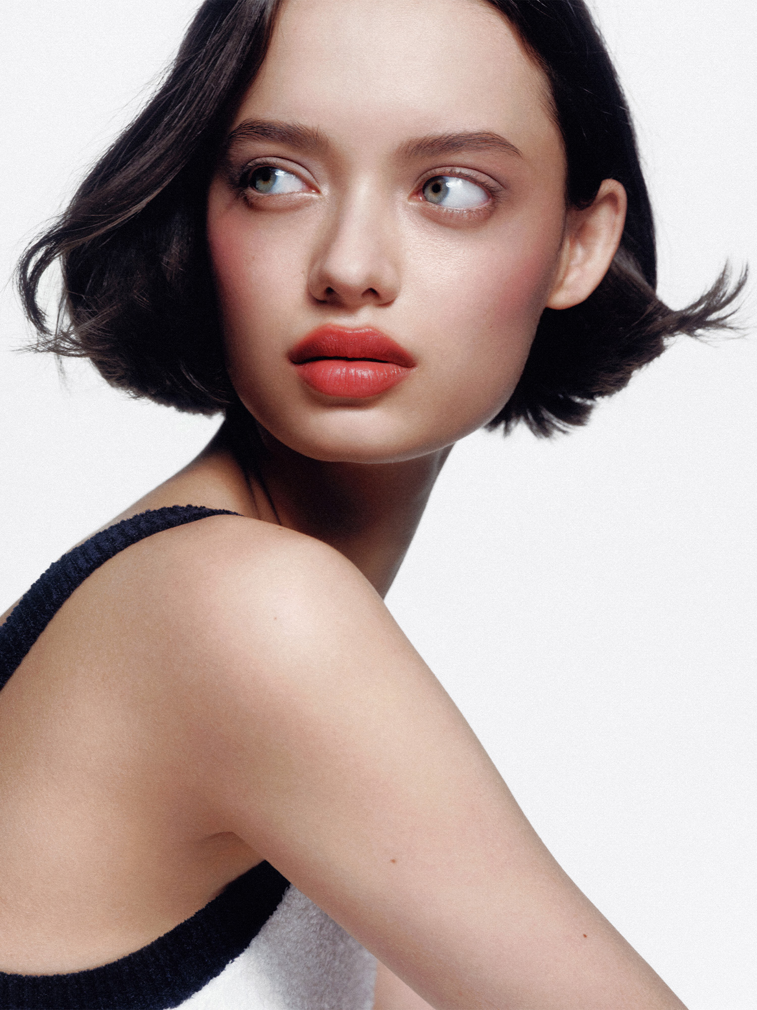 A model wearing the pinched French-girl makeup trend