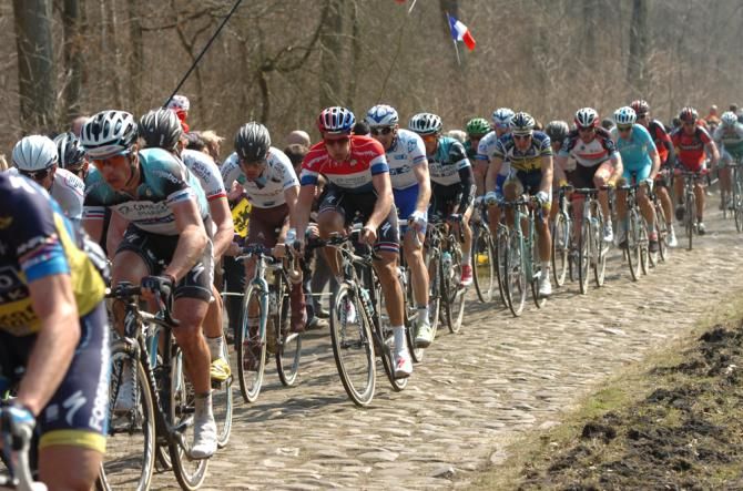 The Paris-Roubaix peloton take on the pave