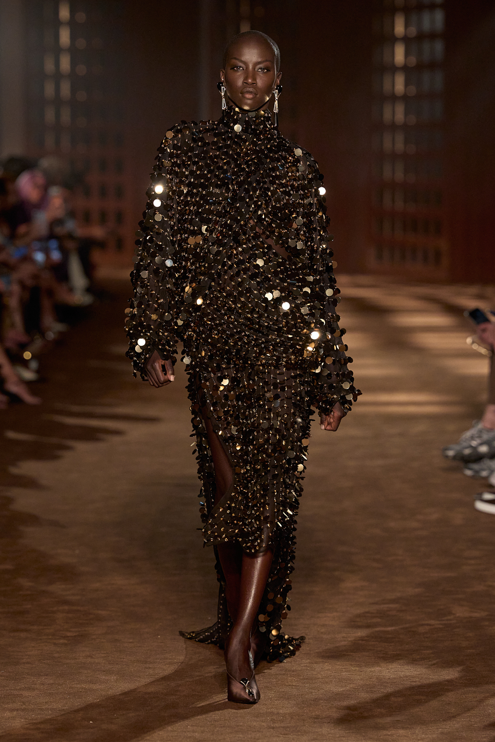 a model walks the ferragamo spring 2027 runway.