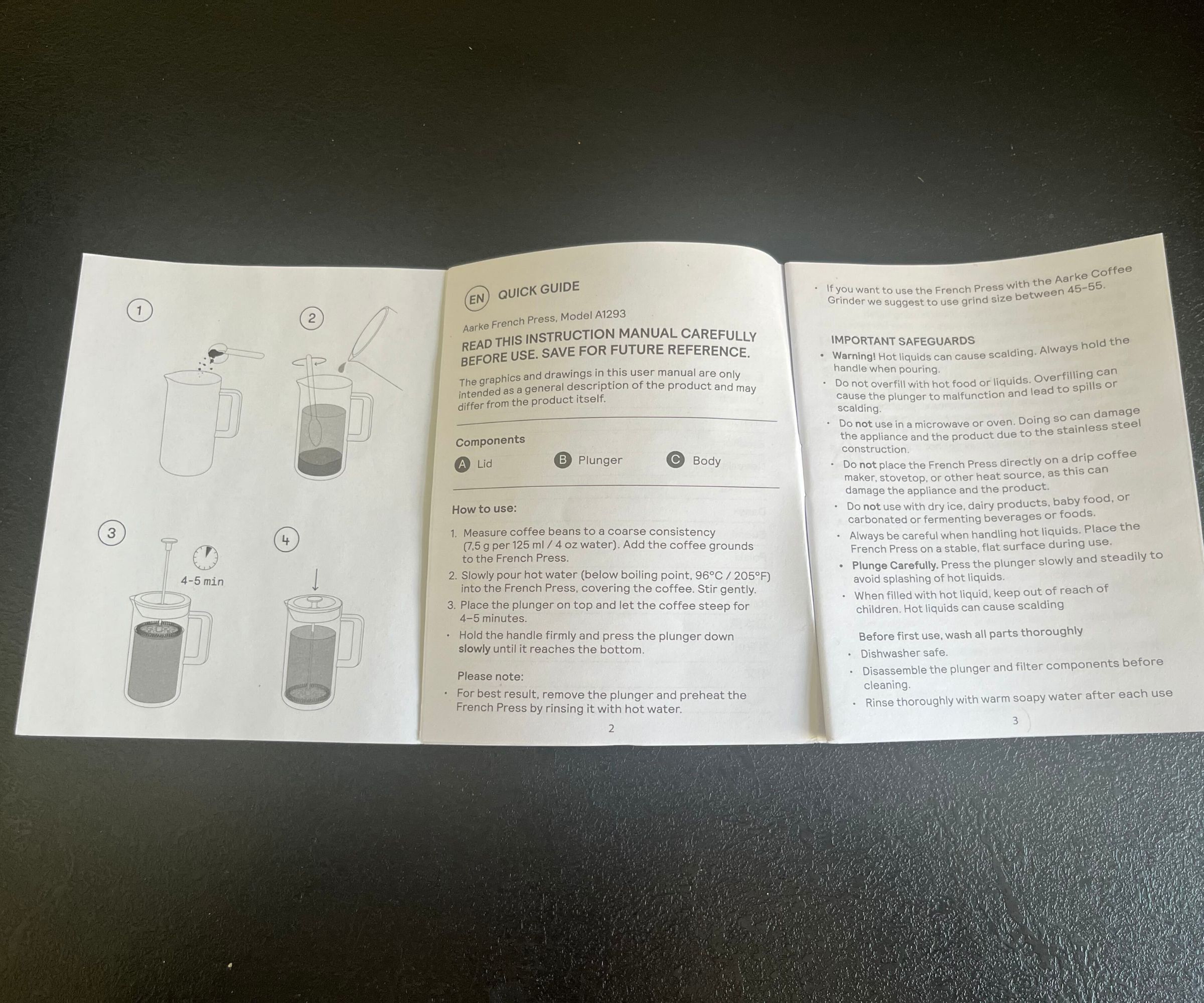 An open instruction manual for the aarke coffee press