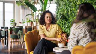 Women talking over coffee