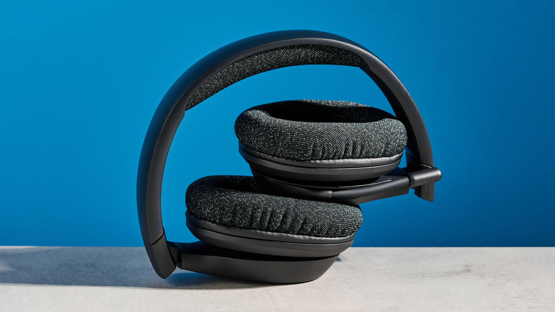 A black Belkin SoundForm Adapt wireless headset