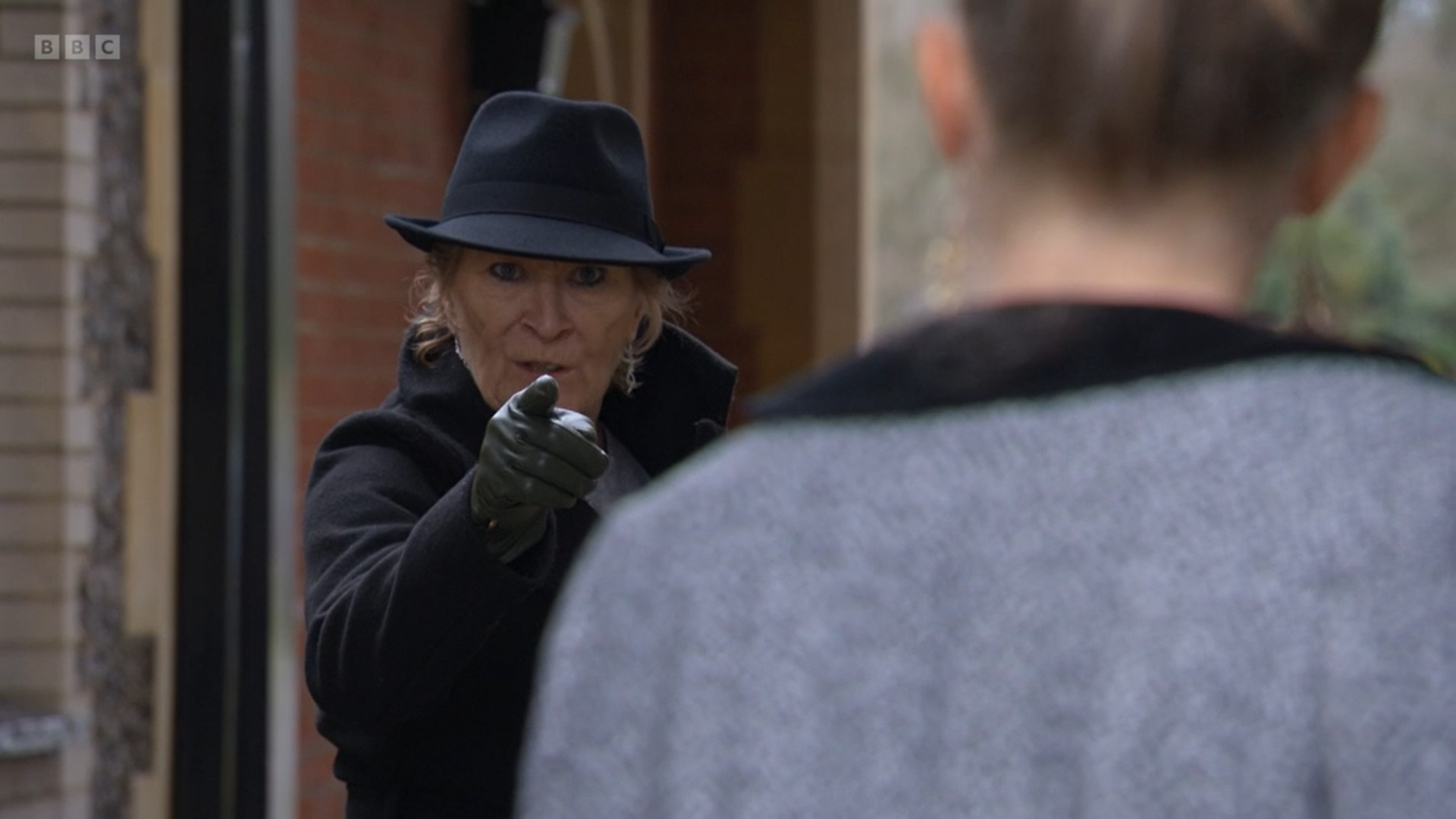 Shirley Carter angrily points at Linda Carter