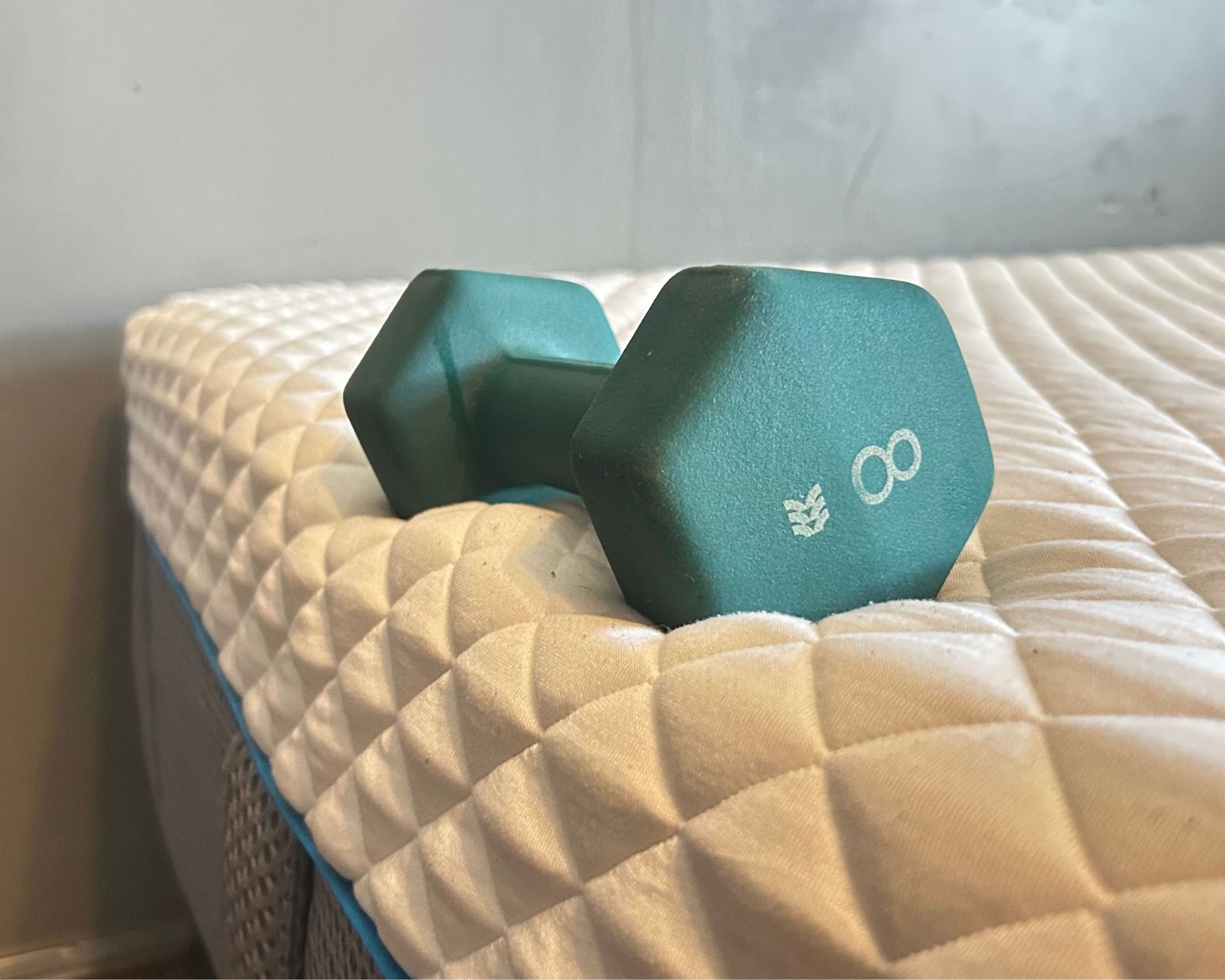 Testing the edge support of the Simba Hybrid Pro mattress.
