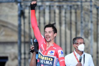 Team Jumbos Slovenian rider Primoz Roglic celebrates after wining the 21st and final stage of the 2021 La Vuelta cycling tour of Spain a 338 km timetrial race from Padron to Santiago de Compostela on September 5 2021 Photo by MIGUEL RIOPA AFP Photo by MIGUEL RIOPAAFP via Getty Images