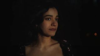 Emilia Suarez in the dark in music video for Timing