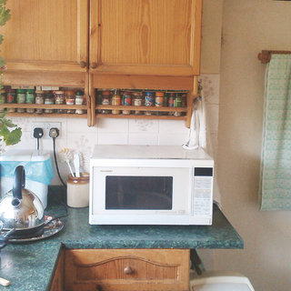 kitchen with wooden storage shelves