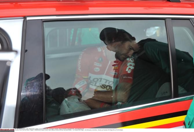 Greg Henderson in a Lotto car after crashing out of the Tour