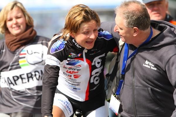 Grace Verbeke is congratulated by Directeur Sportif, Danny Schoonbert after winning the 2010 Ronde van Vlaanderen